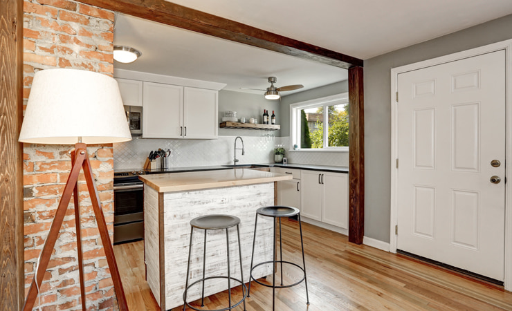 A small kitchen in a light color scheme.