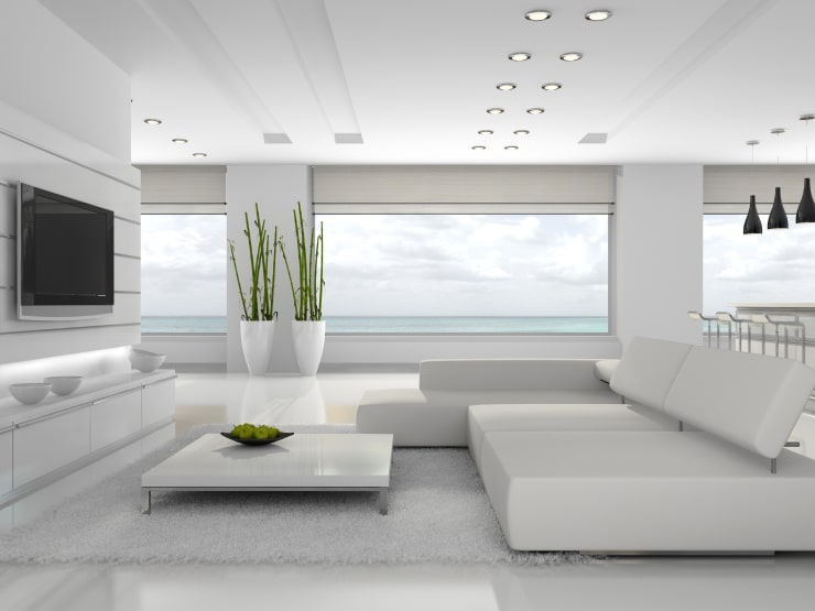 A stylish living room in white colors designed following feng shui rules